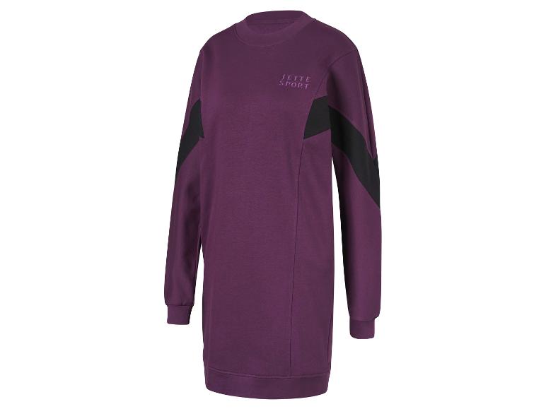 Een paarse sweaterjurk met zwarte details van Jette Sport.