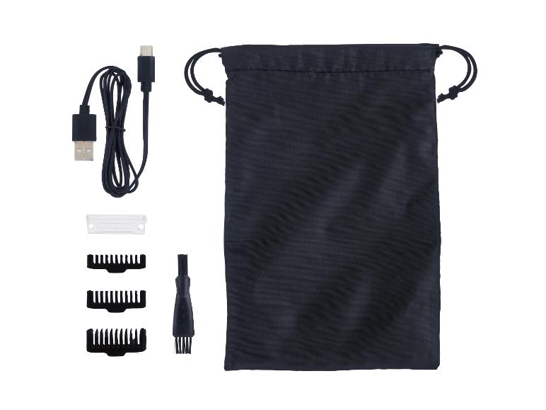 Haartrimmer, accessoires, opbergtas en USB-kabel.