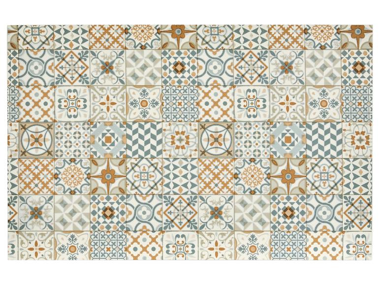 Decoratieve tegels met geometrische en bloemmotieven in aardetinten en blauwgroen.