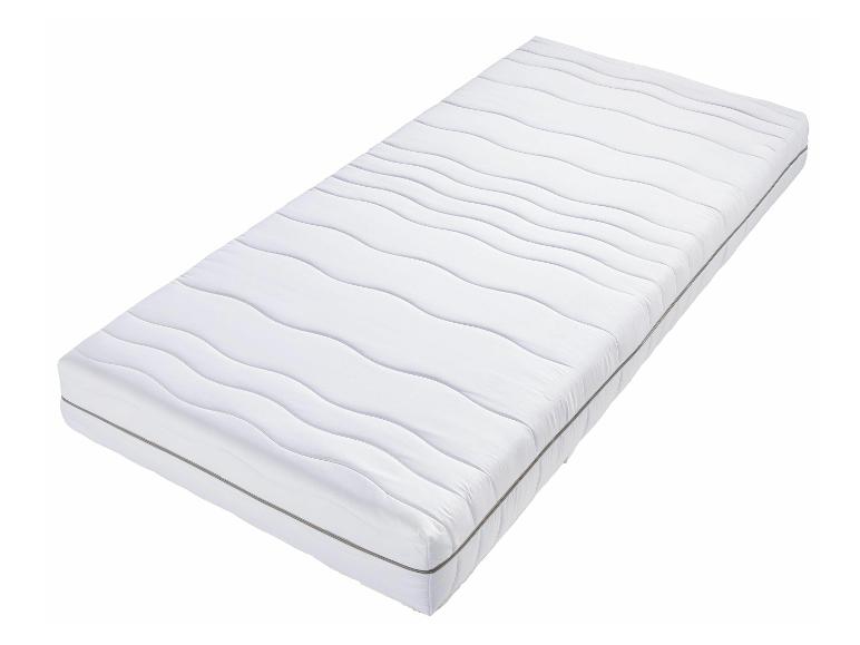 Een wit matras met een golvende steek.
