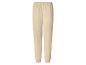 Pantalon de jogging beige avec taille élastique et poignets côtelés.