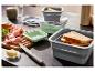Opvouwbare lunchboxen, sandwich, vleeswaren en kaas.