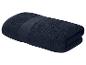 Opgevouwen marineblauwe badhanddoek