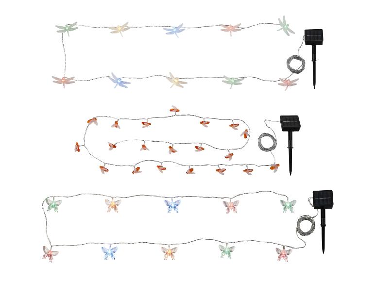 Drie sets decoratieve lampjes op zonne-energie in de vorm van libellen, bijen en vlinders.