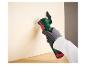 Parkside multifunctioneel gereedschap gebruikt voor het zagen van een houten plank.