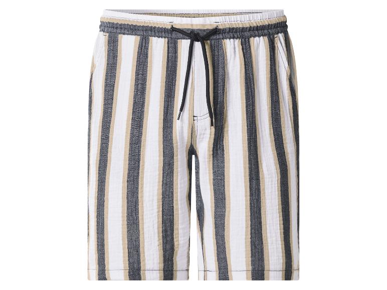 Shorts rayés pour homme avec taille élastique et cordon de serrage en blanc, beige et gris.