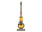 Un aspirateur Dyson jaune et gris.