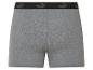 Boxers gris Puma : un tissu confortable et la marque visible sur la ceinture.
