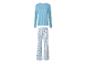 Haut à manches longues bleu clair et pantalon à motifs floraux.