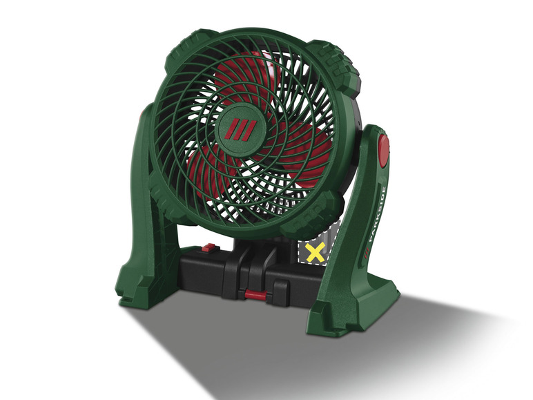 Un ventilateur Parkside vert avec une grille rouge.