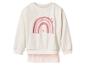 Sweat-shirt crème à manches longues avec un arc-en-ciel rose et des cœurs, avec un ourlet en tulle rose.