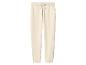 Pantalon de jogging beige clair avec cordon de serrage à la taille et poches.