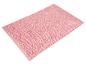 Tapis de bain rectangulaire rose avec une surface texturée à picots