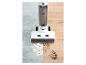Aspirateur pour sols durs nettoyant des céréales renversées et des empreintes sur carrelage et parquet.