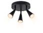 Spot de plafond noir avec trois lampes coniques réglables, émettant une lumière chaude.