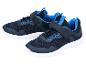 Chaussures de sport enfant bleu marine avec détails bleus et semelles blanches.