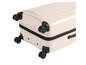 Een beige koffer met wielen.