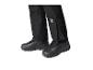 Pantalon de ski noir avec l'étiquette 'Mountain Slopes' et chaussures de ski noires.