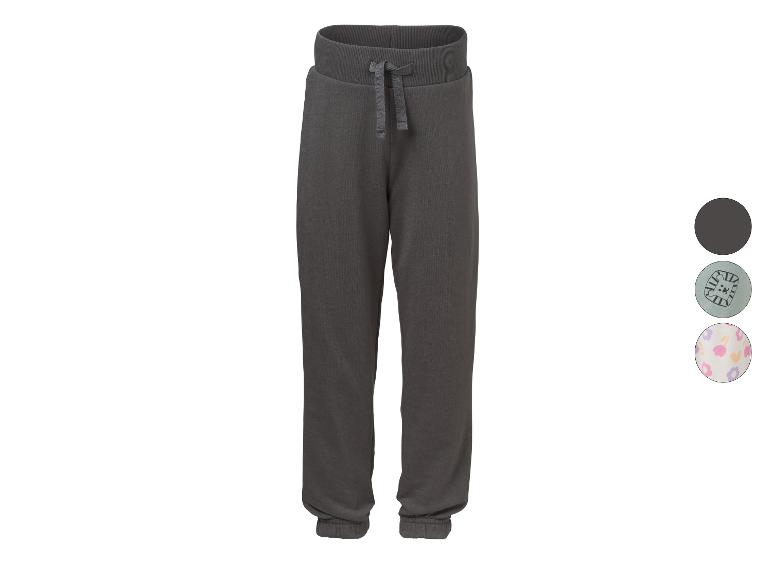 Donkergrijze joggingbroek met trekkoord, getoond met twee patronen.