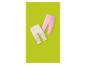 Deux paires de leggings bébé, un crème et un rose, sur fond vert lime.