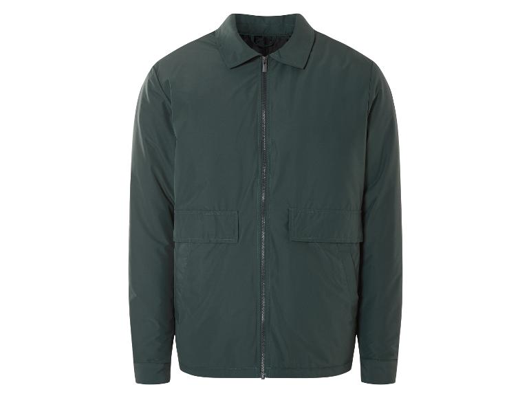 Une veste vert foncé zippée.