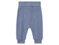 Pantalon bleu pour bébé avec taille élastique.