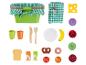 Panier de pique-nique jouet avec nourriture et vaisselle.
