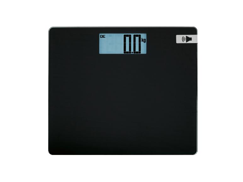 Zwarte personenweegschaal met digitaal display dat '0.0 kg' toont en een luidsprekerpictogram