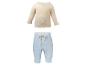 Babyset: beige geribbelde top met lange mouwen en lichtblauwe mousseline broek.