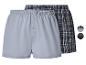 Herenboxershorts, één effen grijs en één geruit in donkerblauw en wit.