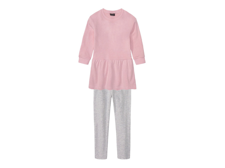 Een roze jurkje met lange mouwen en grijze leggings.