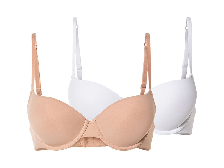 Deux soutiens-gorge, un beige et un blanc.