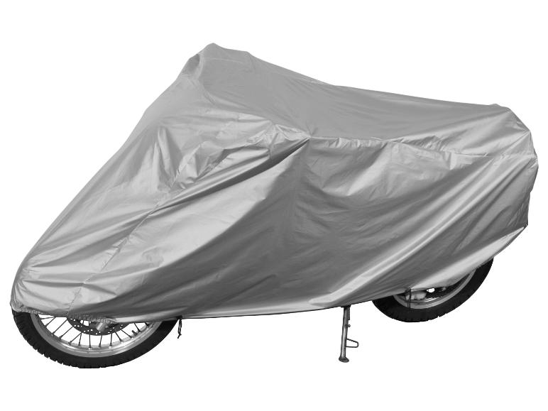 Housse de moto argentée sur fond blanc.
