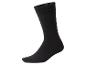 Chaussette noire unie avec des chiffres blancs visibles sur le revers.
