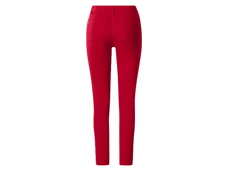 Rode skinny jeans voor dames met hoge taille en achterzakken.