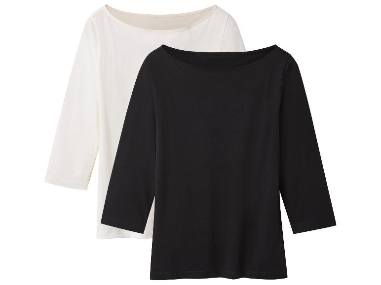 Deux t-shirts à manches trois quarts, un blanc et un noir, avec un col bateau
