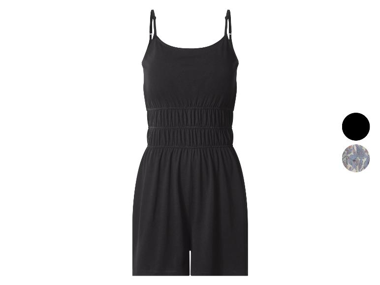 Zwarte korte jumpsuit met spaghettibandjes en elastische taille, effen en met patroon.