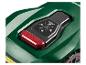Groene Parkside robotmaaier met rode STOP-knop en bedieningspaneel.