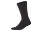 Une chaussette noire sur fond blanc