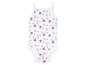 Un body blanc pour bébé avec un motif de cerises et de citrons.