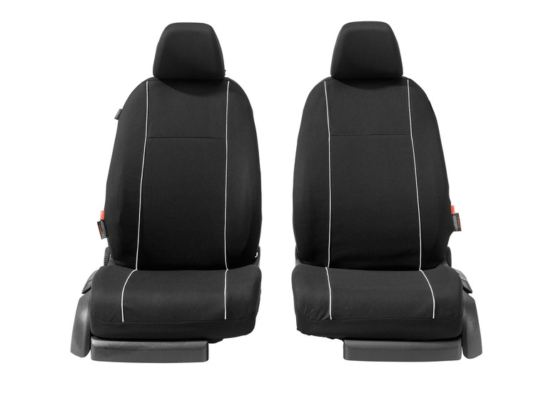 Deux housses de siège de voiture noires avec des coutures blanches.