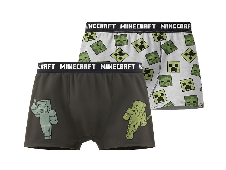Deux boxers pour enfants sur le thème du jeu vidéo, l'un avec des têtes de Creeper, l'autre avec des personnages.