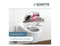 Een toilet met een soft-close toiletbril en een toiletpapierhouder.