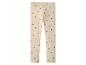 Legging beige à motifs cœurs noirs