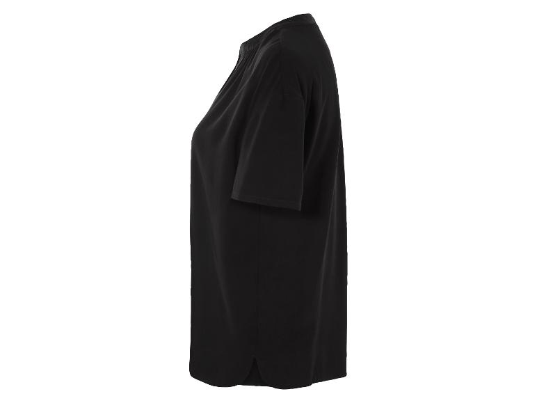 Zwarte blouse met korte mouwen, minimalistische stijl.