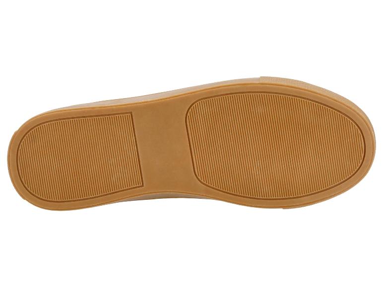 Caramelkleurige sneakerzool met geribbelde textuur