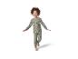 Lachend kind in grijze pyjama met Grinch-print
