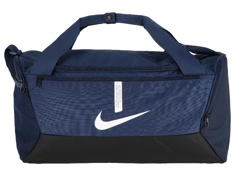 Sac de sport bleu marine avec base noire et logo blanc, avec le texte «ENGINEERED TO THE EXACT SPECIFICATIONS OF CHAMPIONSHIP ATHLETES».