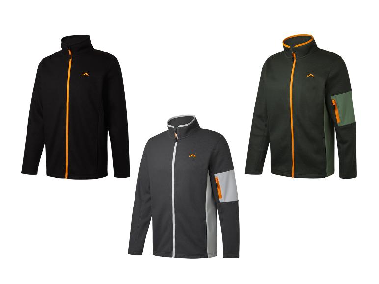 Trois vestes zippées de couleurs différentes.