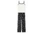 Pyjama femme : débardeur blanc à liseré noir et pantalon fleuri.